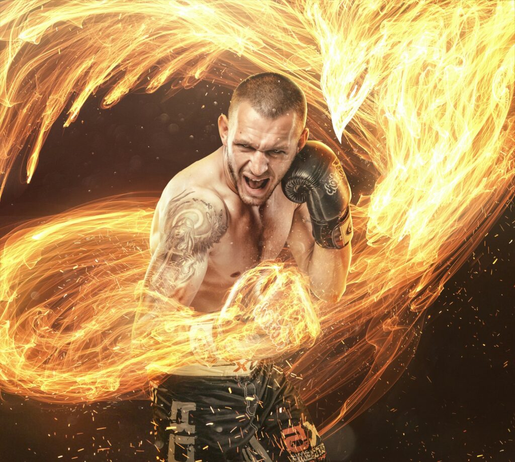 Fighter with phoenix fire bird on background.